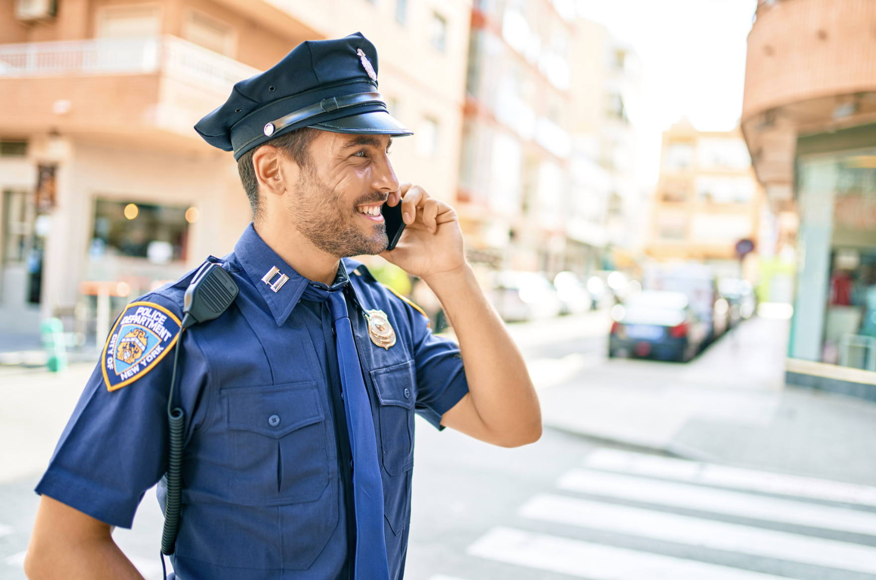 Image of a NYC policeman on the phone